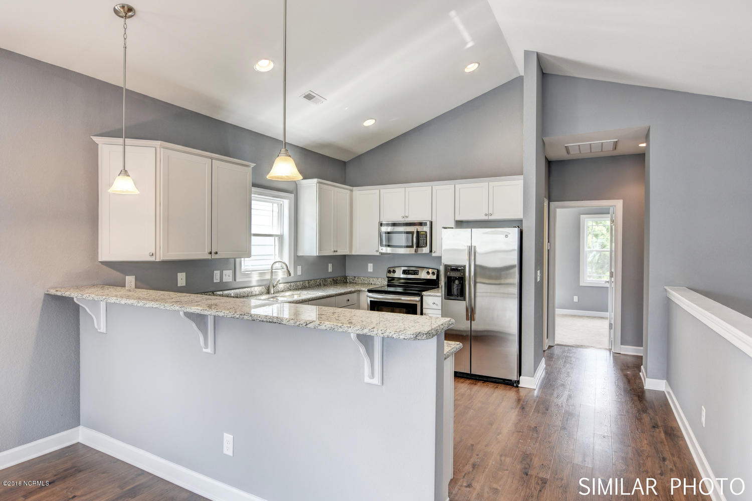 201 Dolphin & Shell Road, Unit G Surf City, NC 28445 - Photo 2 of 24 309 Vista Court Surf City NC-large-002-9