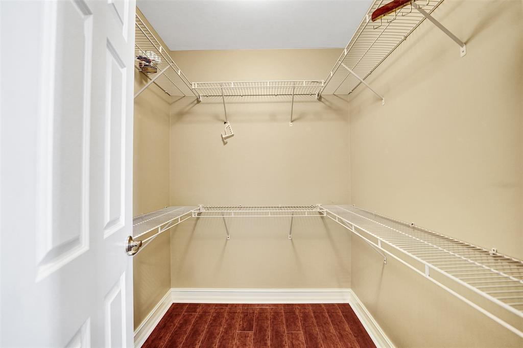 101 Northeast 21st Street Wilton Manors, FL 33305 - Photo 31 of 70 a view of a room with racks on the wall