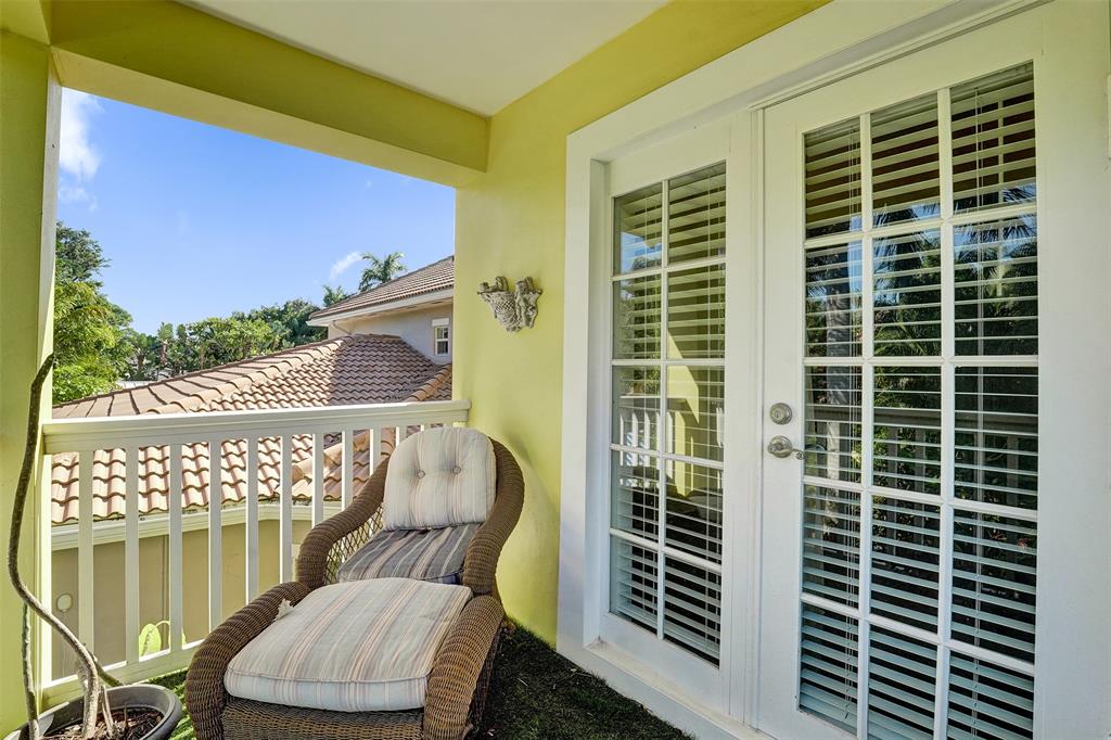 101 Northeast 21st Street Wilton Manors, FL 33305 - Photo 38 of 70 a view of balcony with a couple of chairs