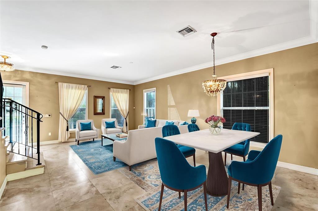 101 Northeast 21st Street Wilton Manors, FL 33305 - Photo 4 of 70 a view of a dining room with furniture