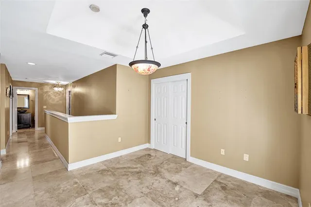 a view of swimming pool with a patio