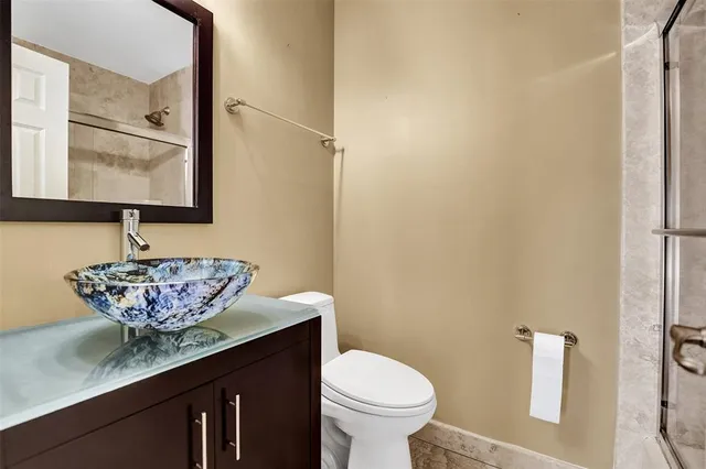 a view of a swimming pool with a patio