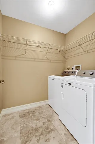 a view of a house with swimming pool and sitting area