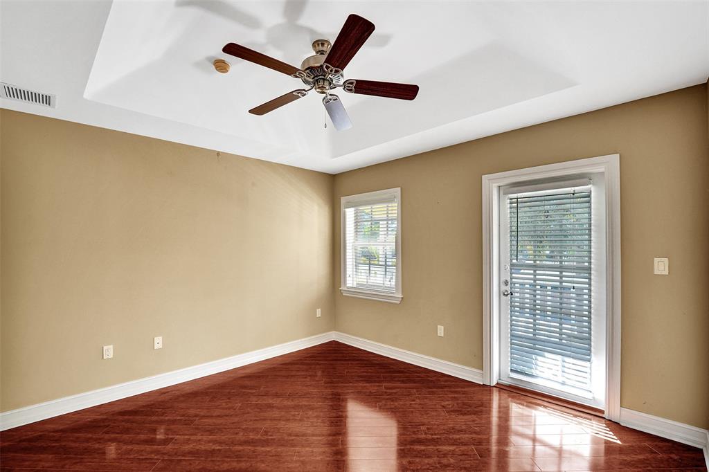 101 Northeast 21st Street Wilton Manors, FL 33305 - Photo 50 of 70 a view of a big room with wooden floor and windows