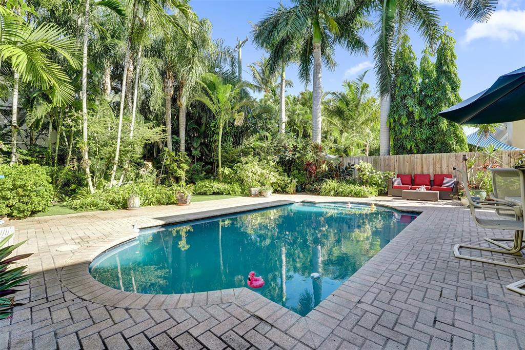 101 Northeast 21st Street Wilton Manors, FL 33305 - Photo 53 of 70 a view of a swimming pool with a patio