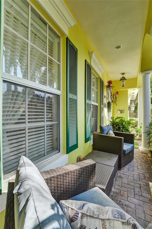 101 Northeast 21st Street Wilton Manors, FL 33305 - Photo 62 of 70 a view of a balcony with couch