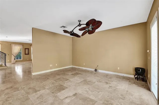 a large bathroom with a large tub and sink