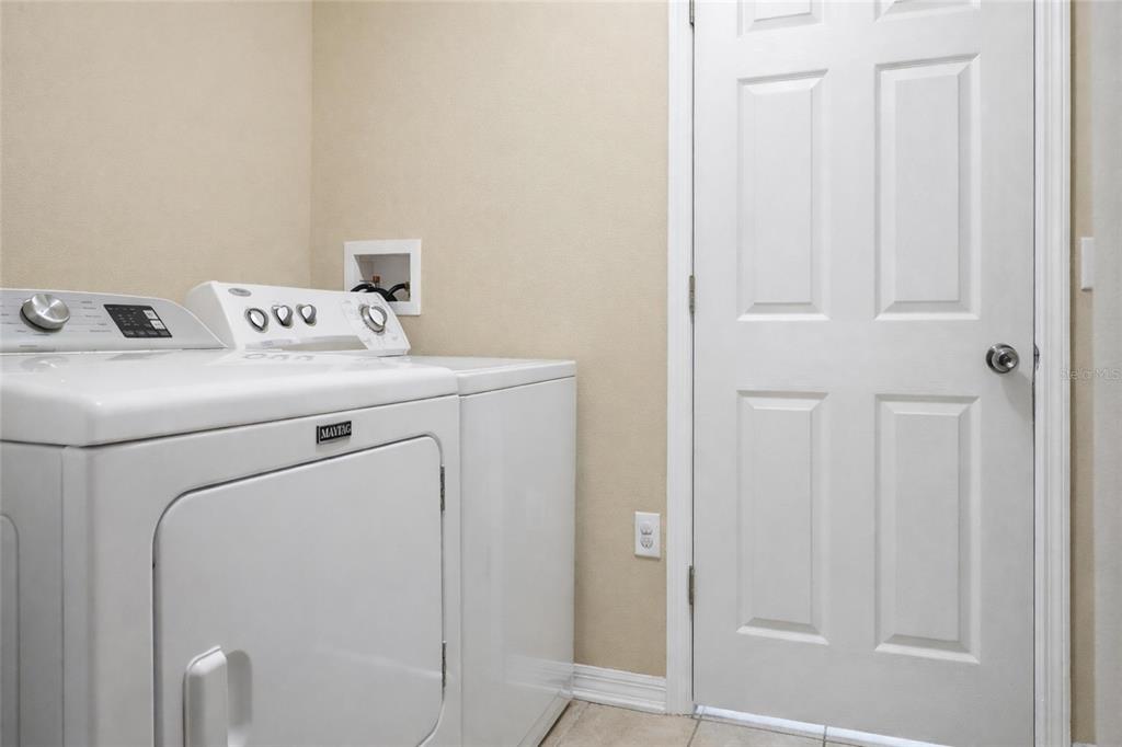 2120 Nicollett Way Leesburg, FL 34748 - Photo 16 of 22 a utility room with dryer and washer