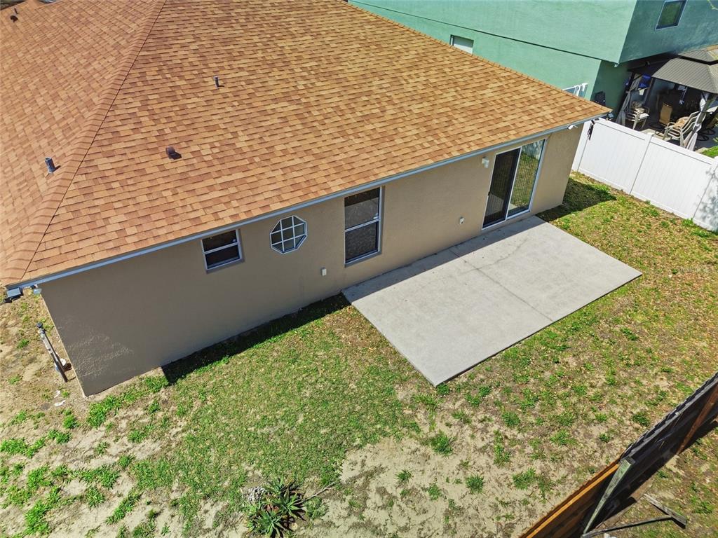 2120 Nicollett Way Leesburg, FL 34748 - Photo 21 of 22 a view of a backyard