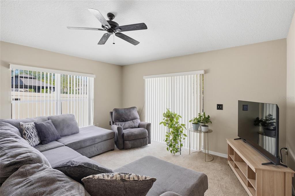 2120 Nicollett Way Leesburg, FL 34748 - Photo 6 of 22 a living room with furniture