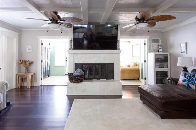 a bedroom with a bed and a television