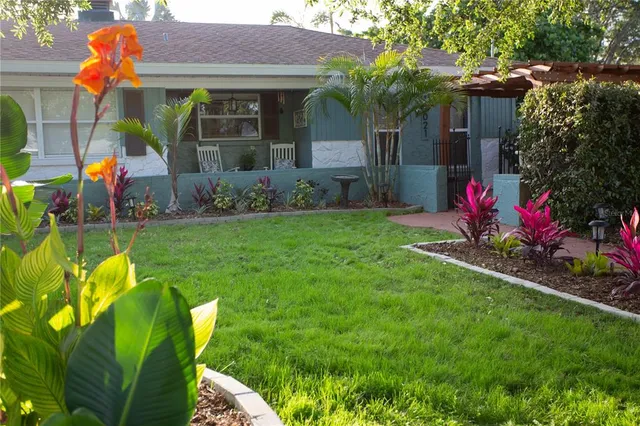 a view of swimming pool with outdoor seating