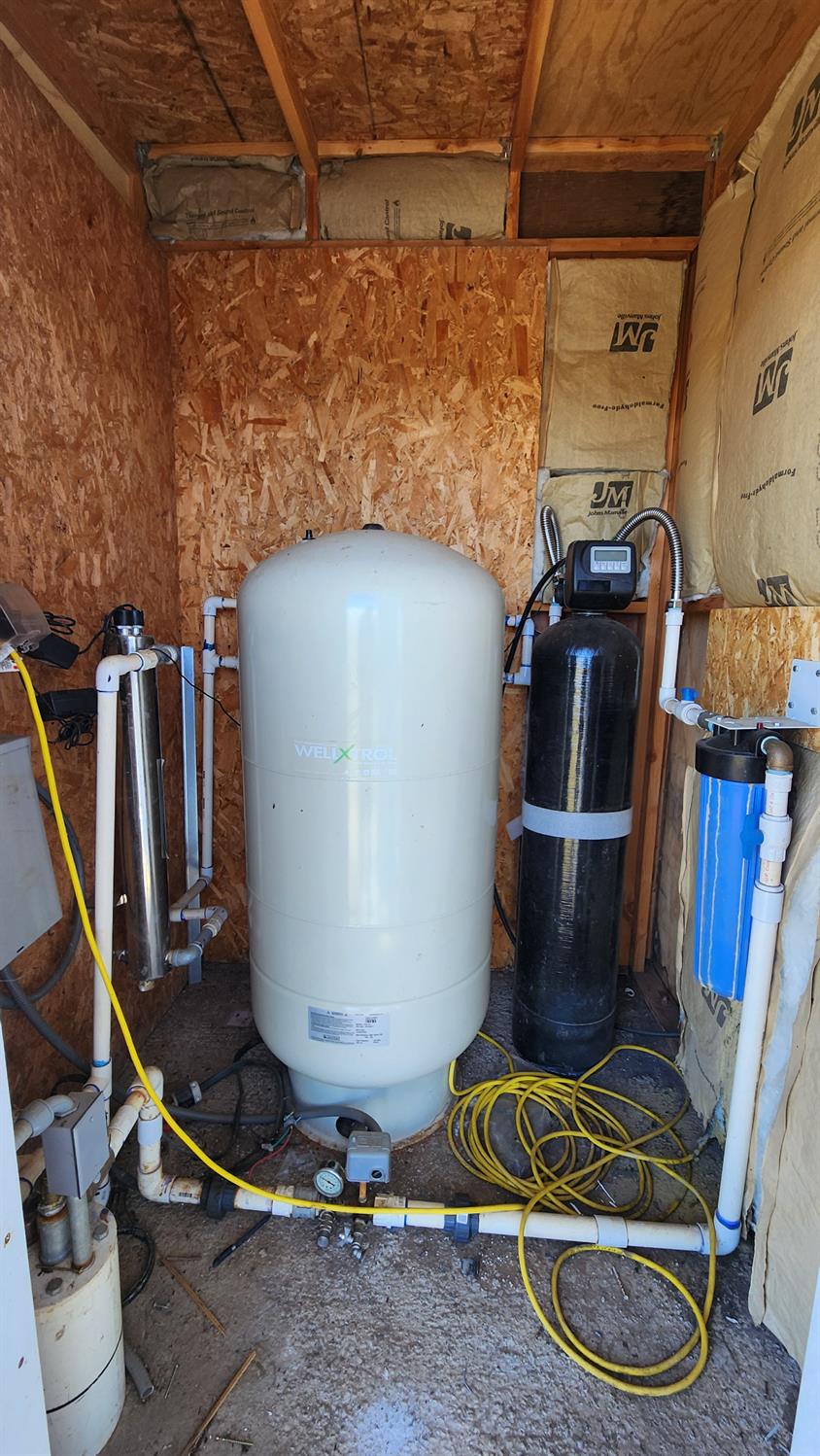 9197 Green Ranch Road Mountain Ranch, CA 95246 - Photo 5 of 10 a room with water heater and wooden cabinets