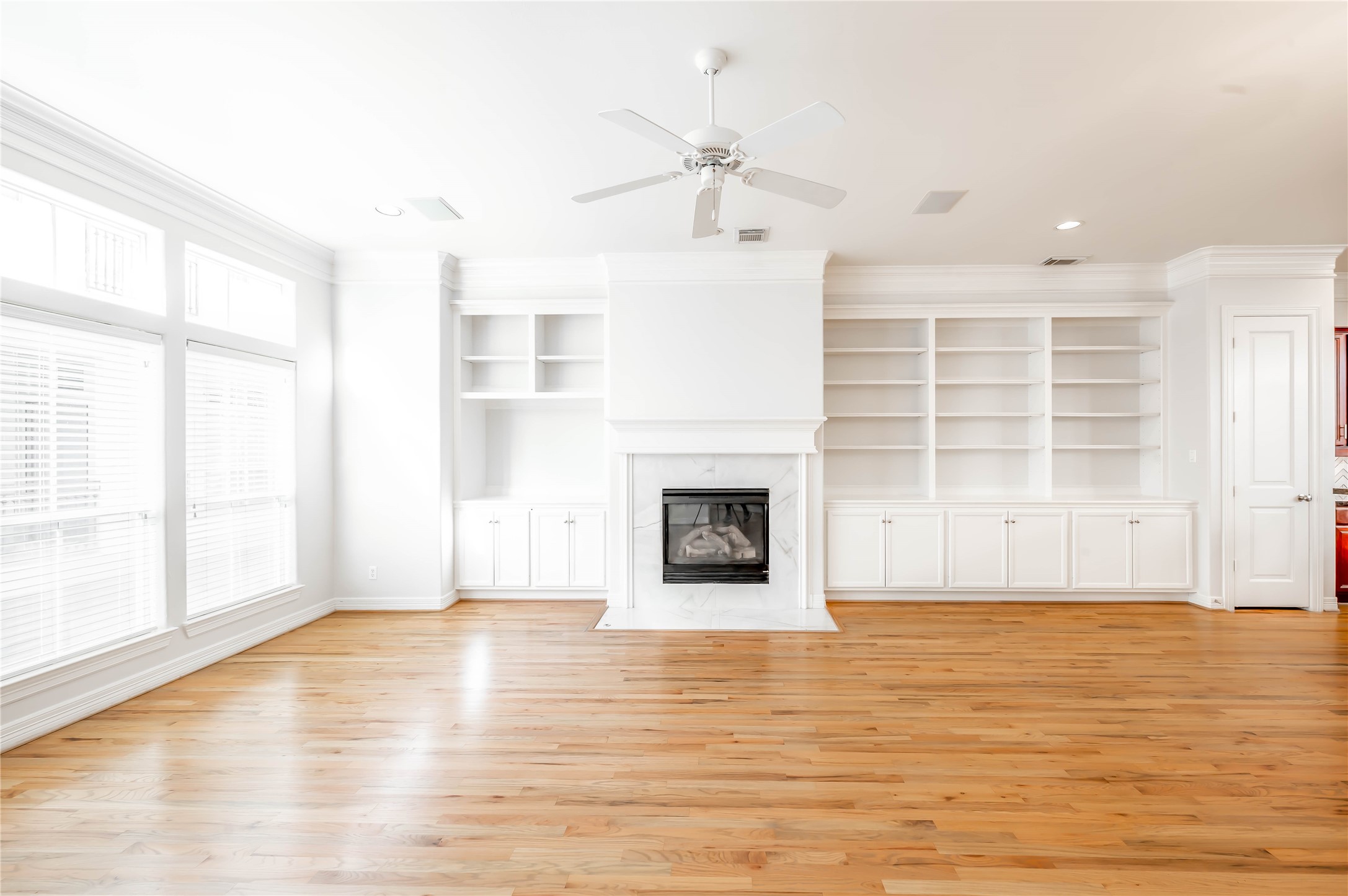 643 Hartman Street Houston, TX 77007 - Photo 17 of 42 Gas Fireplace Flanked With Custom Built Ins For Storage