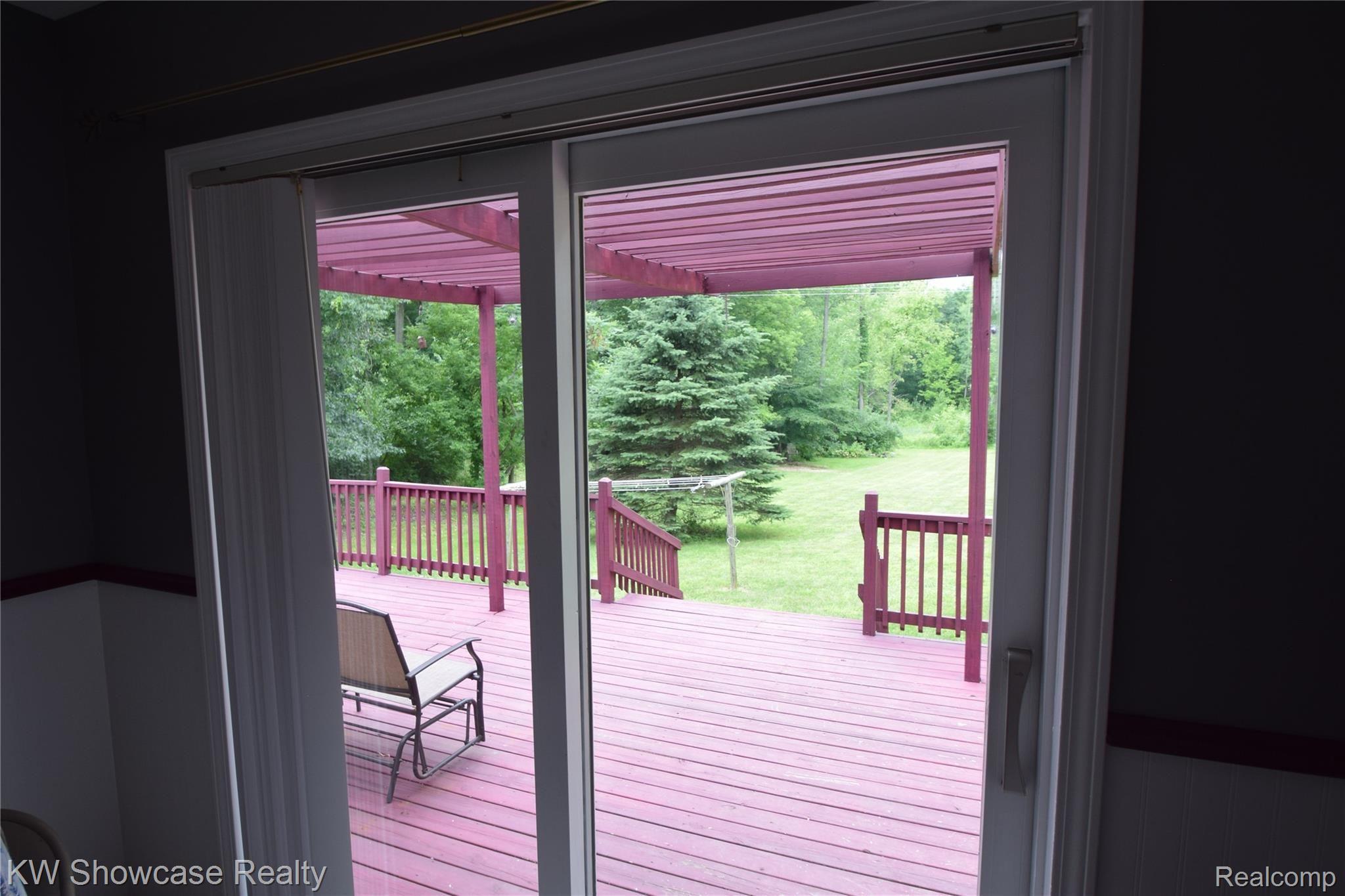 5386 Dutcher Road Howell, MI 48843 - Photo 9 of 23 Door wall leading to deck.
