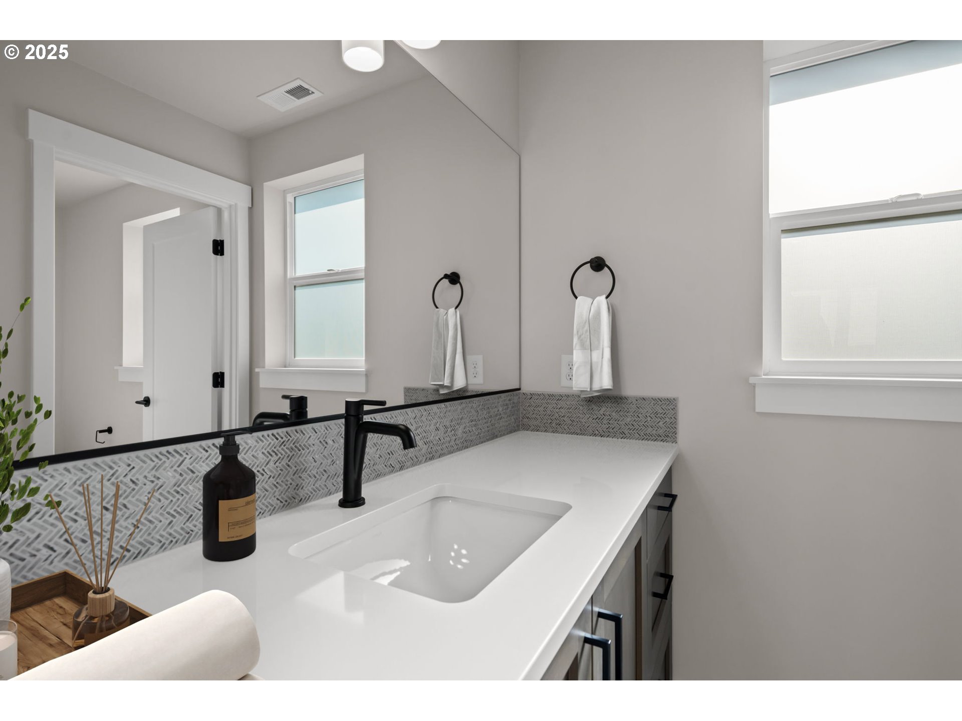 2463 North Villa Road Newberg, OR 97132 - Photo 9 of 10 a bathroom with a sink and a mirror