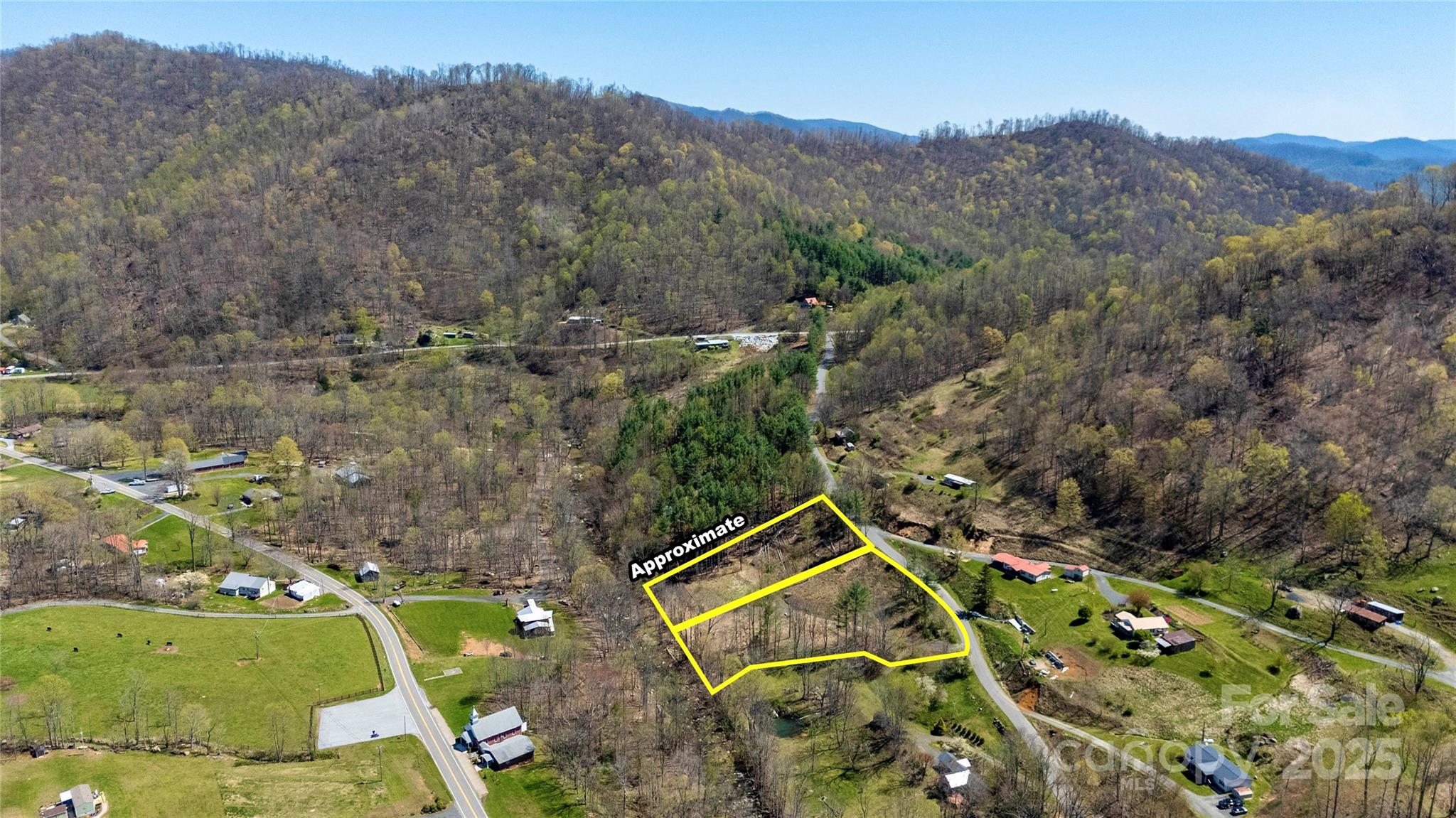 0 Pumpkin Patch Road Bakersville, NC 28705 - Photo 6 of 38 an aerial view of a house with a garden