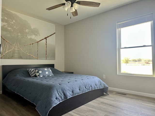 1323 Sioux Turn Kankakee, IL 60901 - Photo 8 of 15 a bedroom with a bed and window