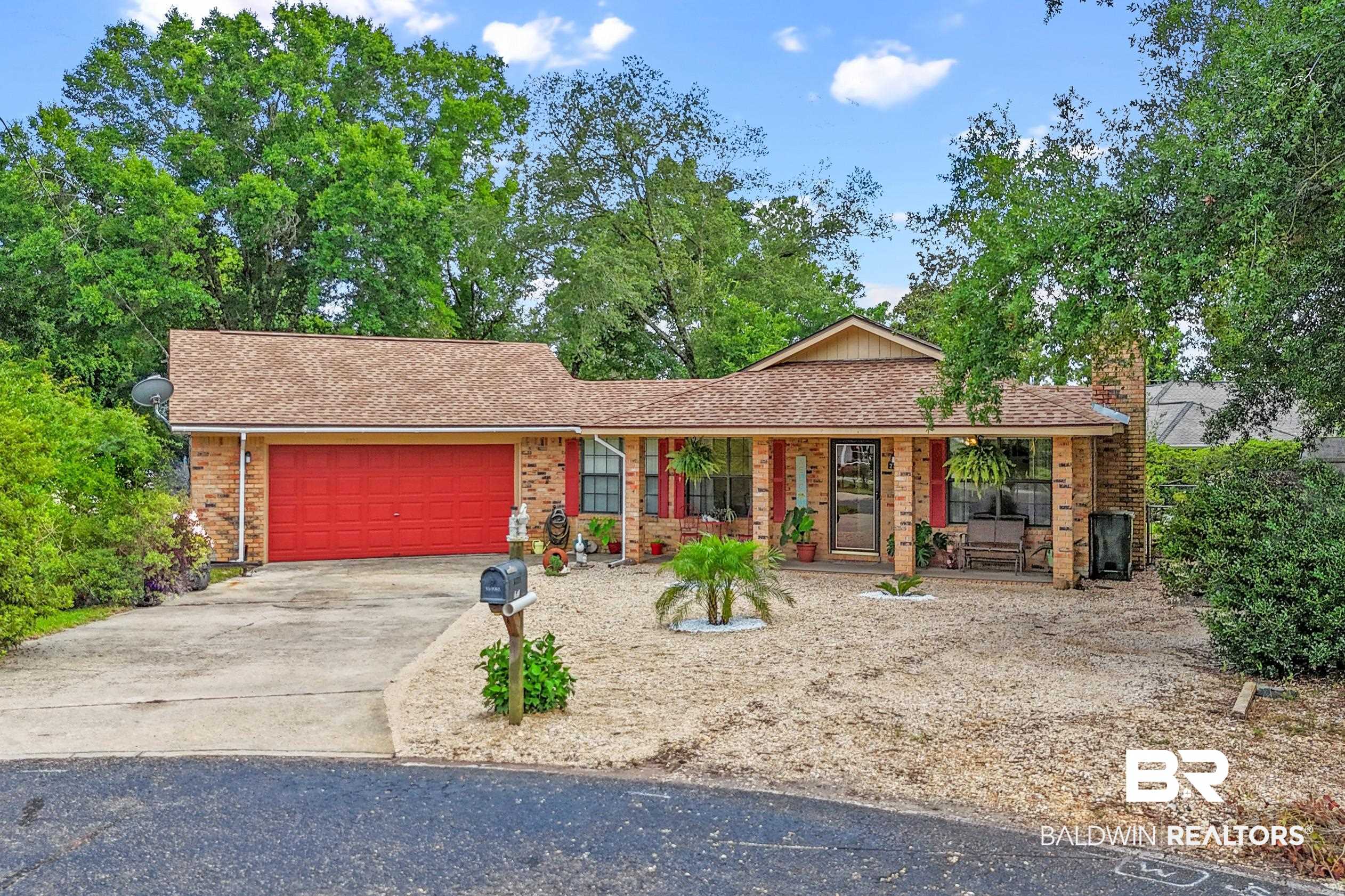 2772 Santa Rosa Circle Lillian, AL 36549 - Photo 35 of 50 Ranch-style house featuring a garage and a porch