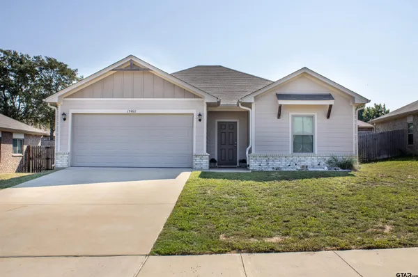 a front view of house with yard