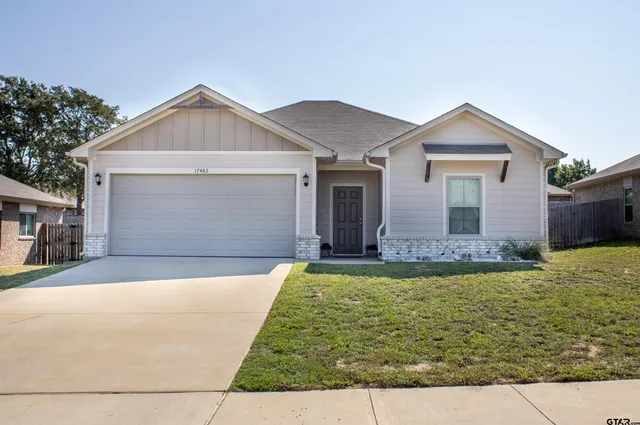 a front view of house with yard