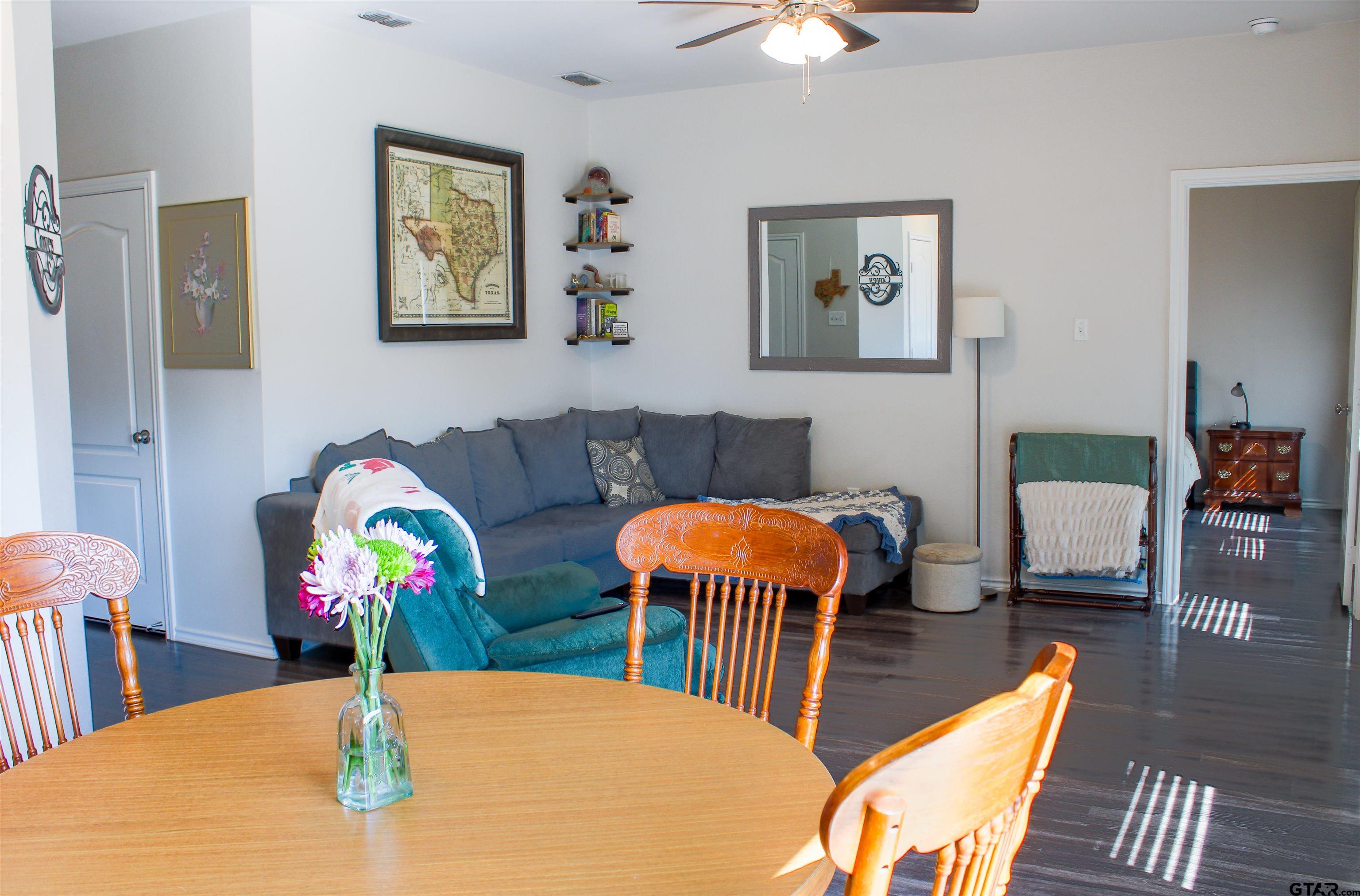 17482 Stacy Street Lindale, TX 75771 - Photo 2 of 12 a living room with furniture and wooden floor