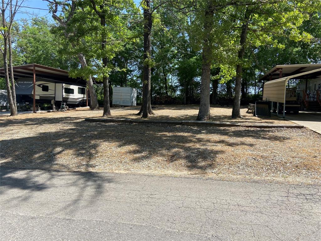 5800 Private Road 5800 Yantis, TX 75497 - Photo 1 of 1 4 lots with 2 covered RV parking areas and a two-car carport