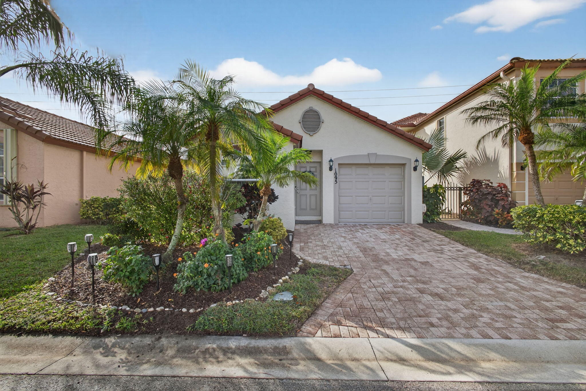 1095 Via Jardin Riviera Beach, FL 33418 - Photo 2 of 44 2-web-or-mls-5D1A5137