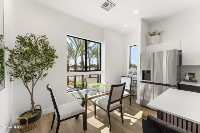 a view of staircase with white walls