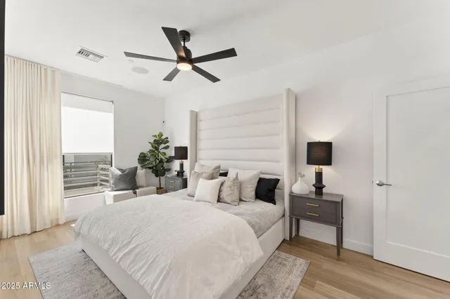 a large kitchen with a table and chairs in it