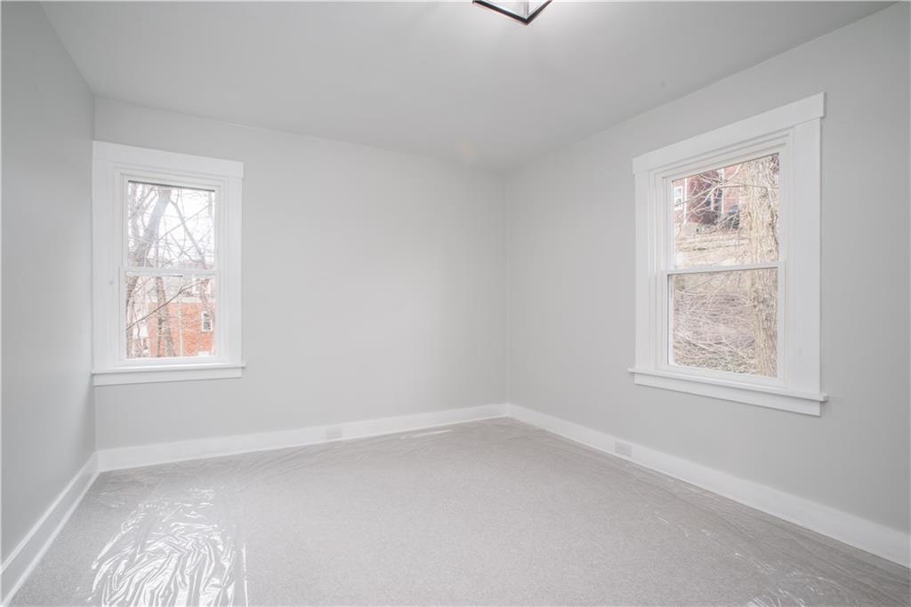 85 Pasadena Street Pittsburgh, PA 15211 - Photo 17 of 25 an empty room with a window