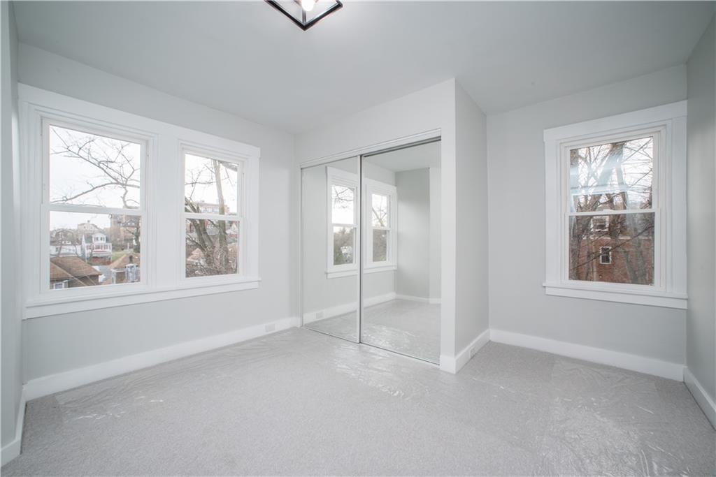 85 Pasadena Street Pittsburgh, PA 15211 - Photo 19 of 25 a view of an empty room with a window