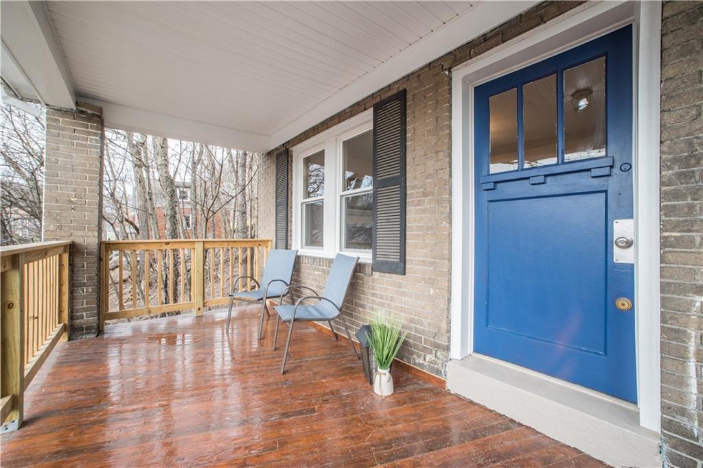 85 Pasadena Street Pittsburgh, PA 15211 - Photo 2 of 25 a view of a livingroom with wooden floor and furniture