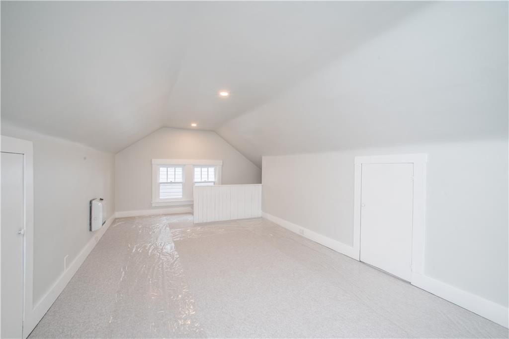 85 Pasadena Street Pittsburgh, PA 15211 - Photo 24 of 25 wooden floor in an empty room with a window