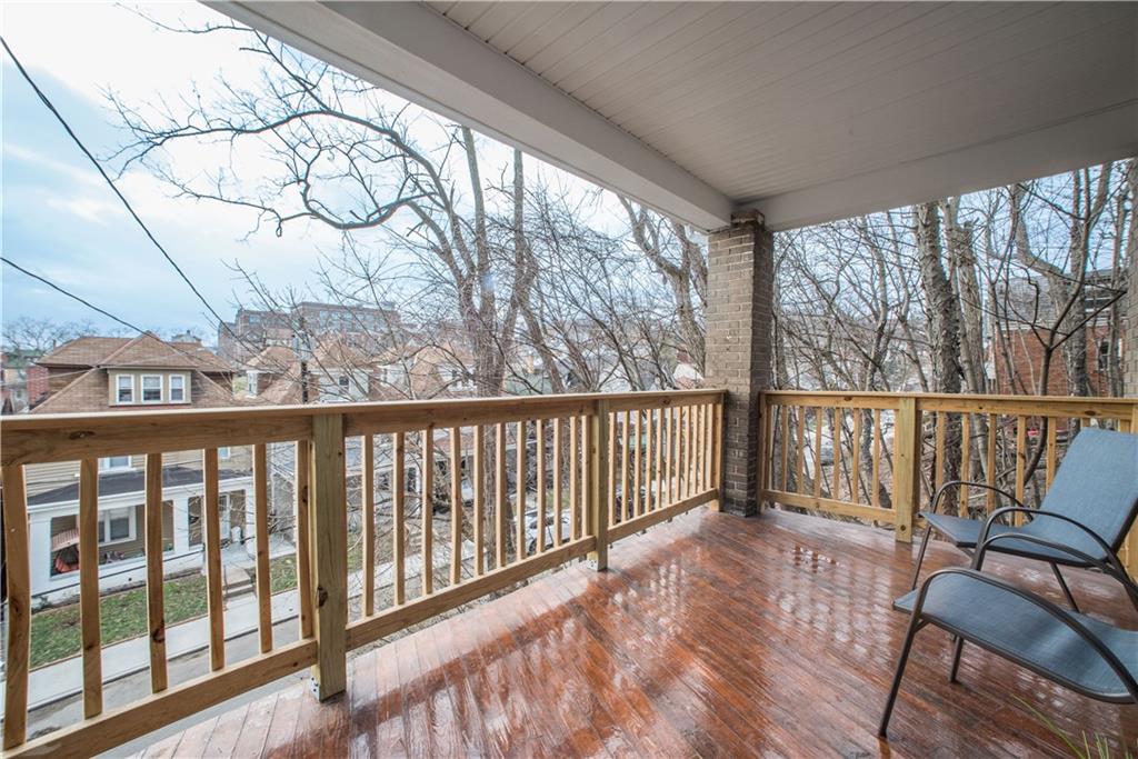 85 Pasadena Street Pittsburgh, PA 15211 - Photo 3 of 25 a view of a two chairs in the balcony