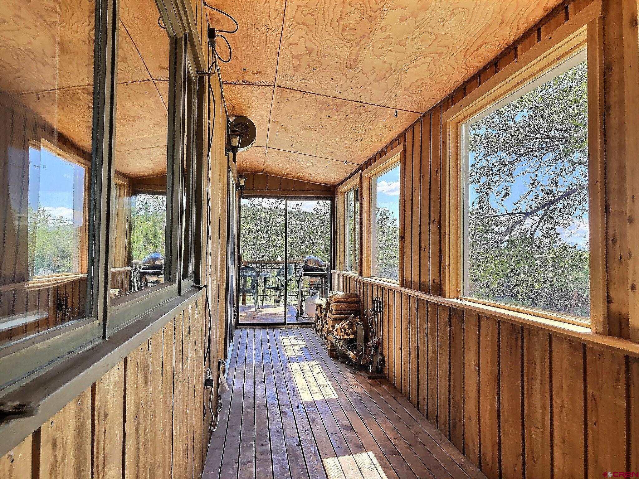 21939-21951 2225 Road Cedaredge, CO 81413 - Photo 32 of 35 a view of a balcony with wooden floor