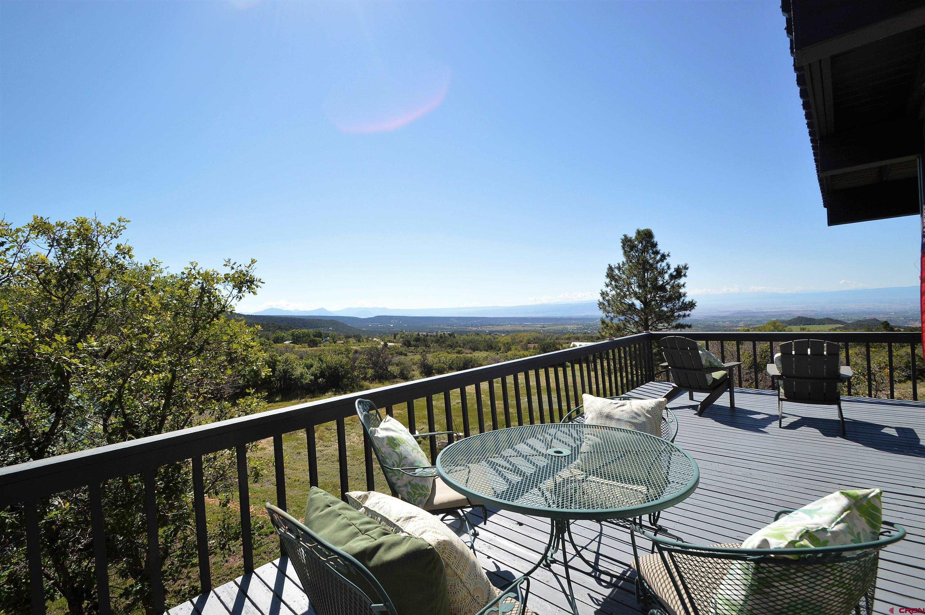 21939-21951 2225 Road Cedaredge, CO 81413 - Photo 7 of 35 a view of a balcony with furniture
