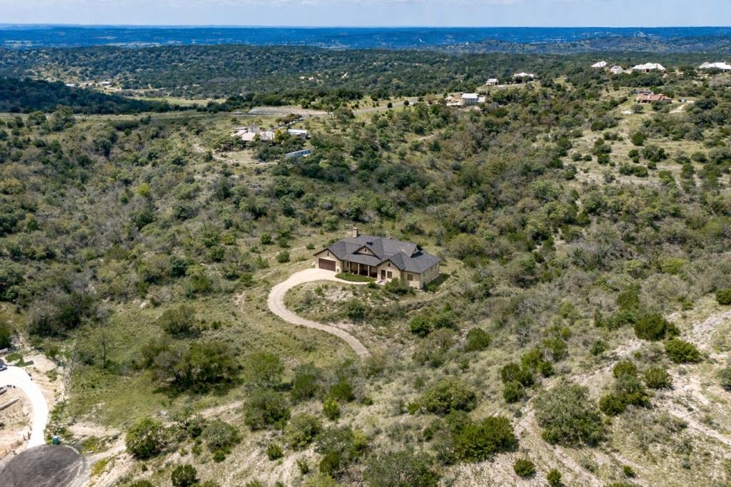 130 Dripping Spring Drive North Comfort, TX 78013 - Photo 14 of 16 a view of a city with lush green forest
