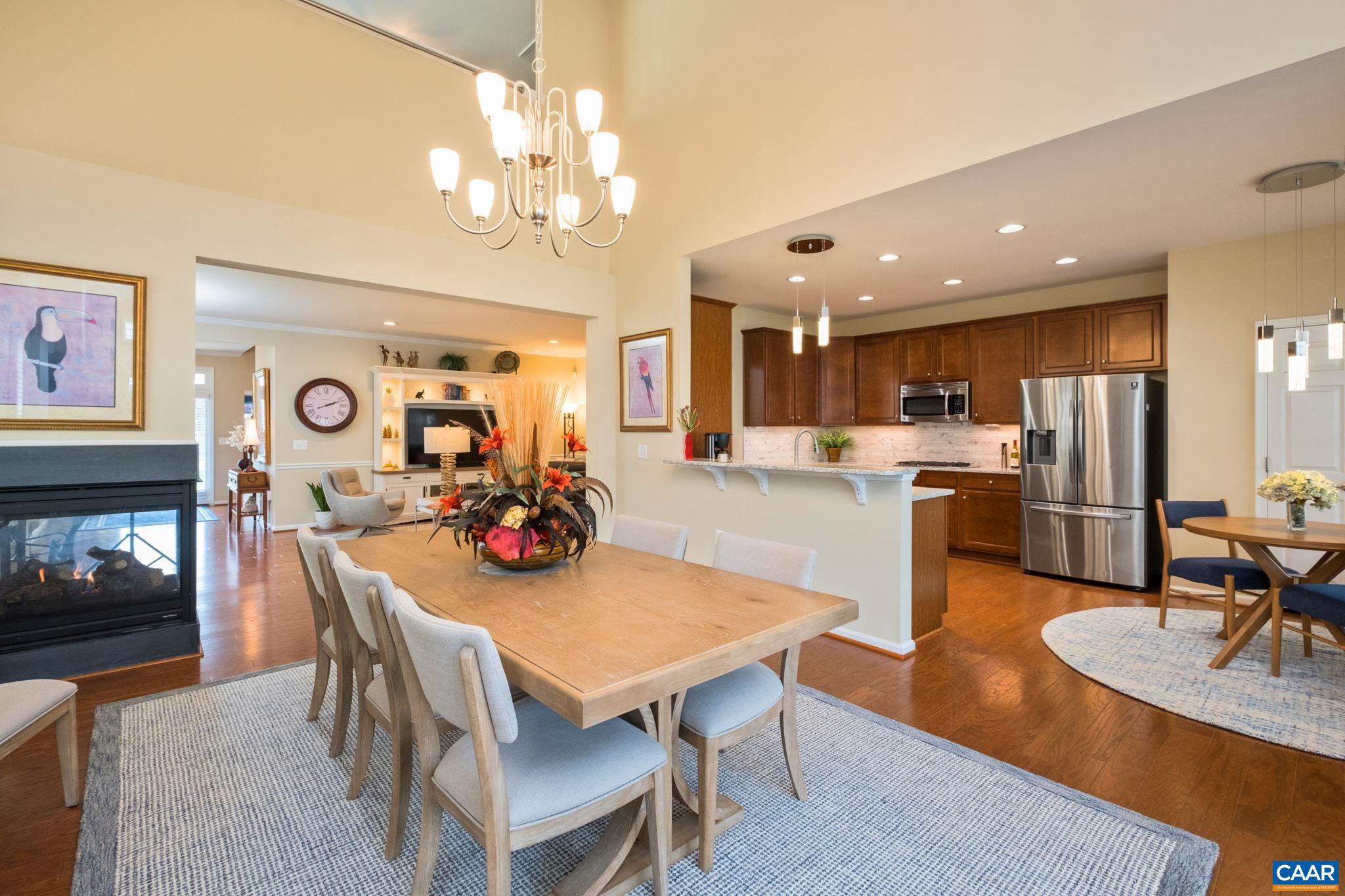56 John Rucker Drive Ruckersville, VA 22968 - Photo 15 of 38 a view of a dining room with furniture and wooden floor