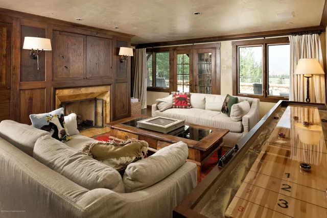 a view of entryway livingroom and hall with wooden floor