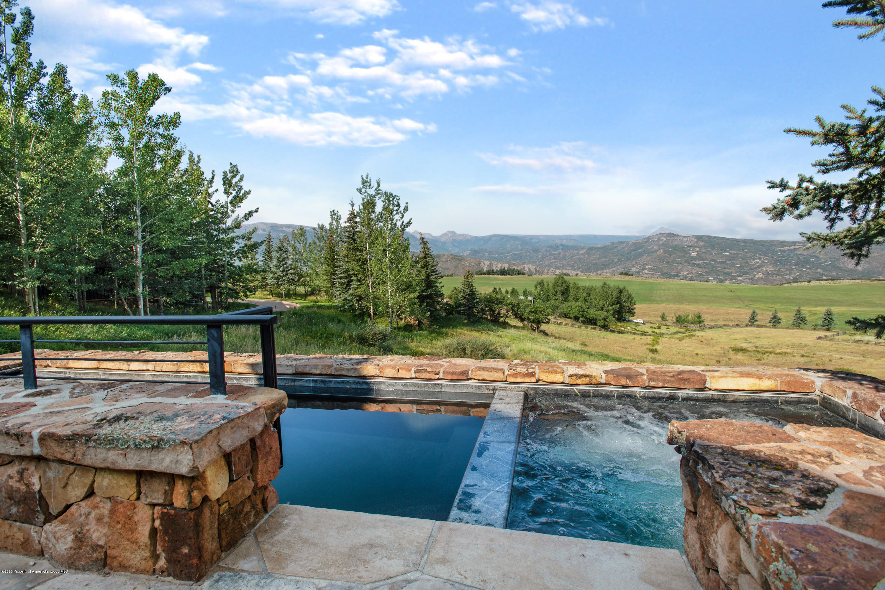 565 North Starwood Road Aspen, CO 81612 - Photo 31 of 50 a swimming pool view with a outdoor space