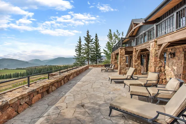 a view of a yard with an outdoor space and seating