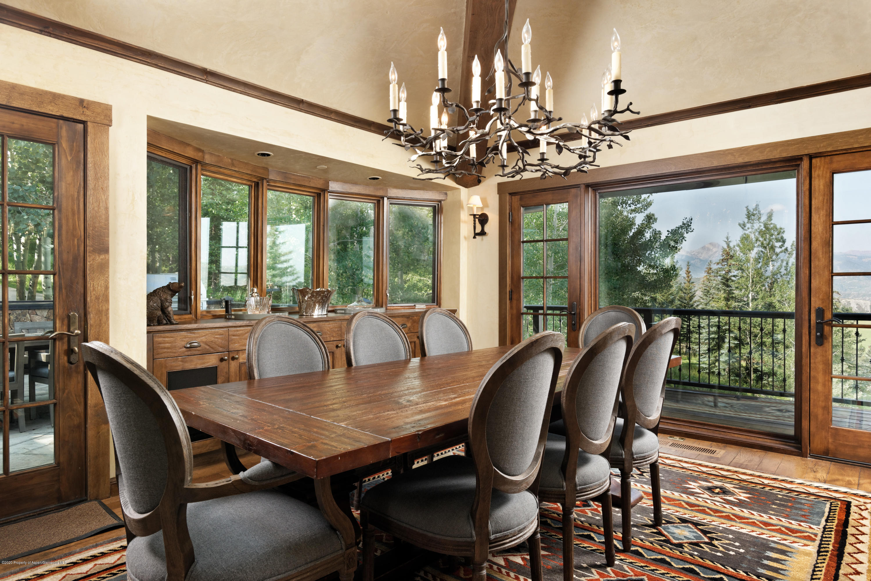 565 North Starwood Road Aspen, CO 81612 - Photo 8 of 50 a view of a dining room with furniture window and outside view