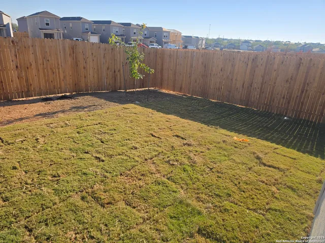 a view of wooden fence