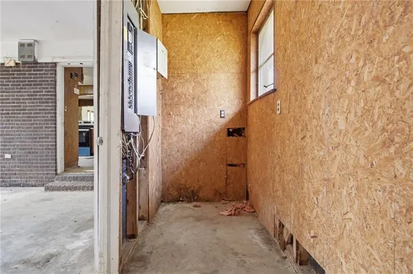 a view of a bathroom with a shower and a sink