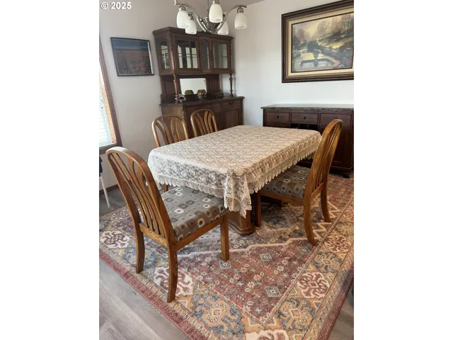 a view of a dining room with furniture