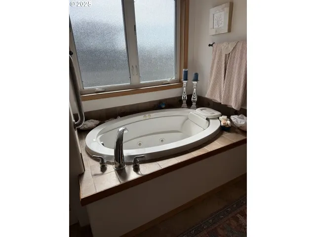 a close up of a sink and a mirror