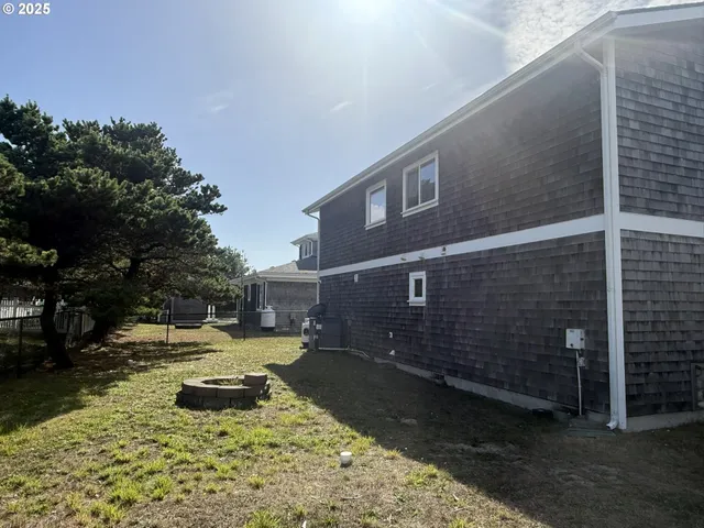 a view of swimming pool with sitting area