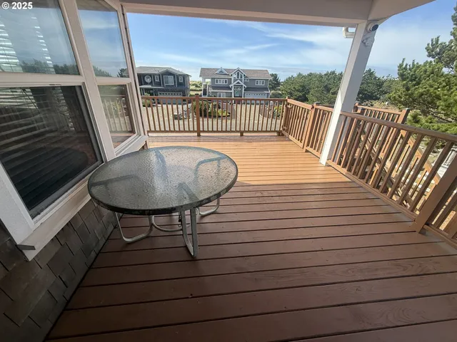 a view of a balcony with furniture