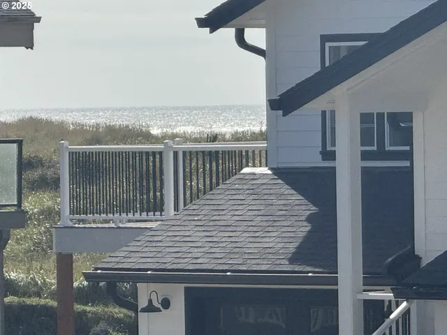 a view of balcony with wooden floor